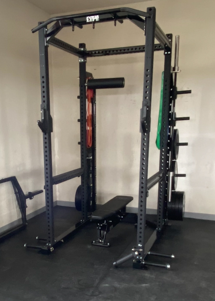 NFL Player Private Garage Gym Equipped with Commercial Power Lift Racks